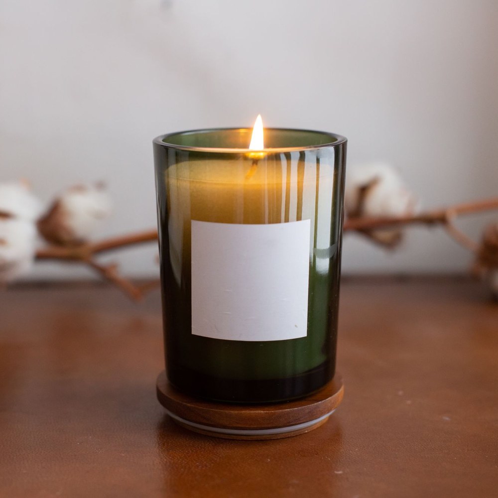 Linen Morning candle in an amber glass jar